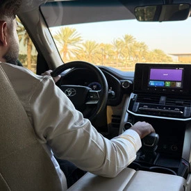 Rent a car with driver service in Abu Dhabi