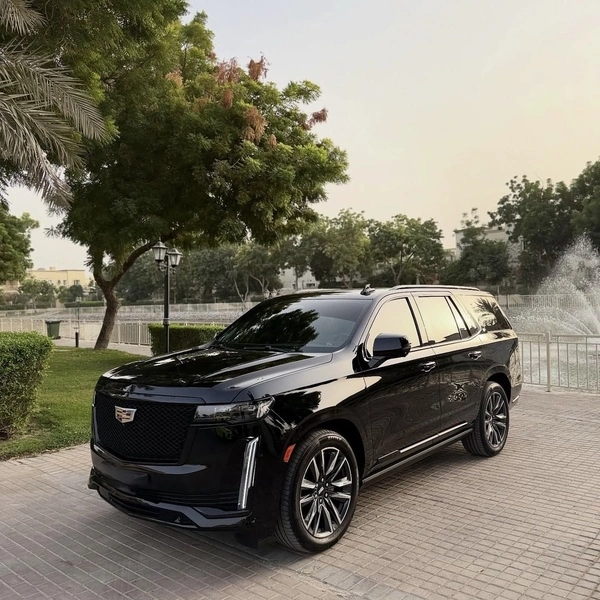 Rent a car with driver Abu Dhabi – black Cadillac Escalade chauffeur SUV
